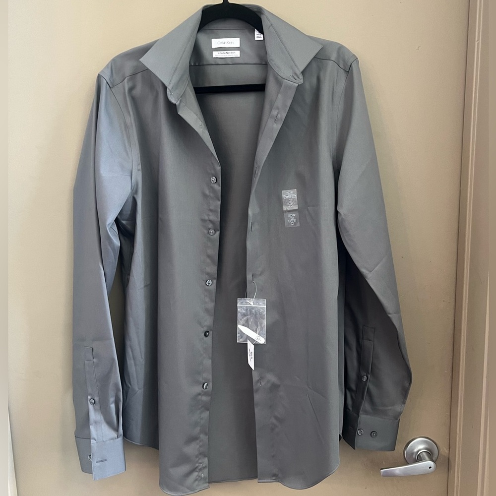 NWT- Calvin Klein Men’s button down shirt - New With Tags! Size 15 34/35